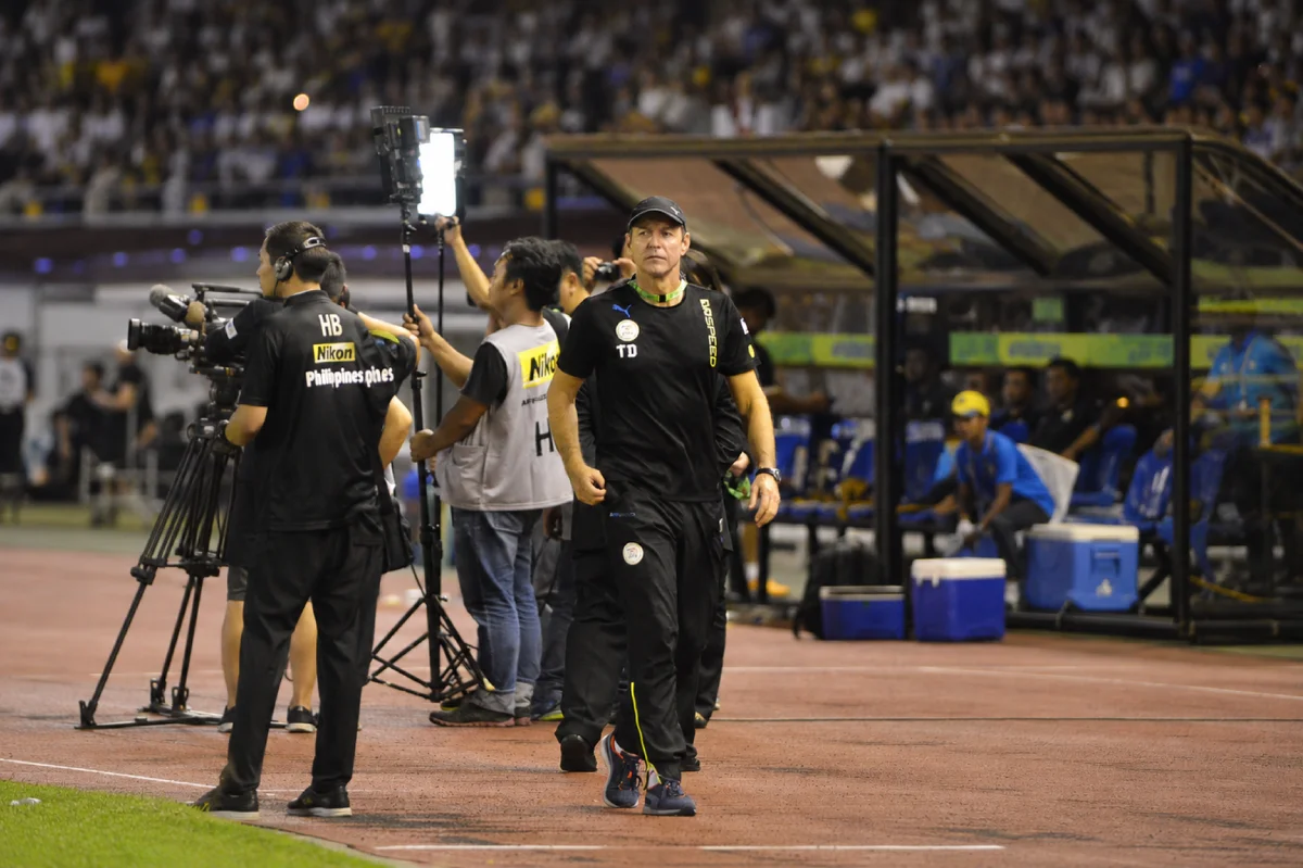 Thomas Dooley with the V.League I championship trophy in Vietnam.
