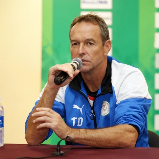 Thomas Dooley with a championship trophy.